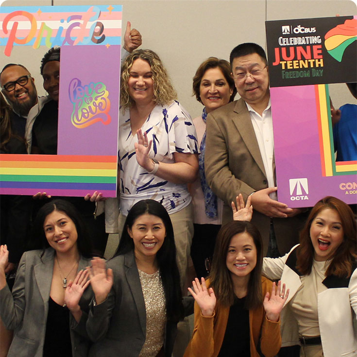 A group of OCTA team members smiling at the camera