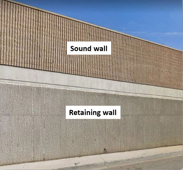 sound wall on top of retaining wall