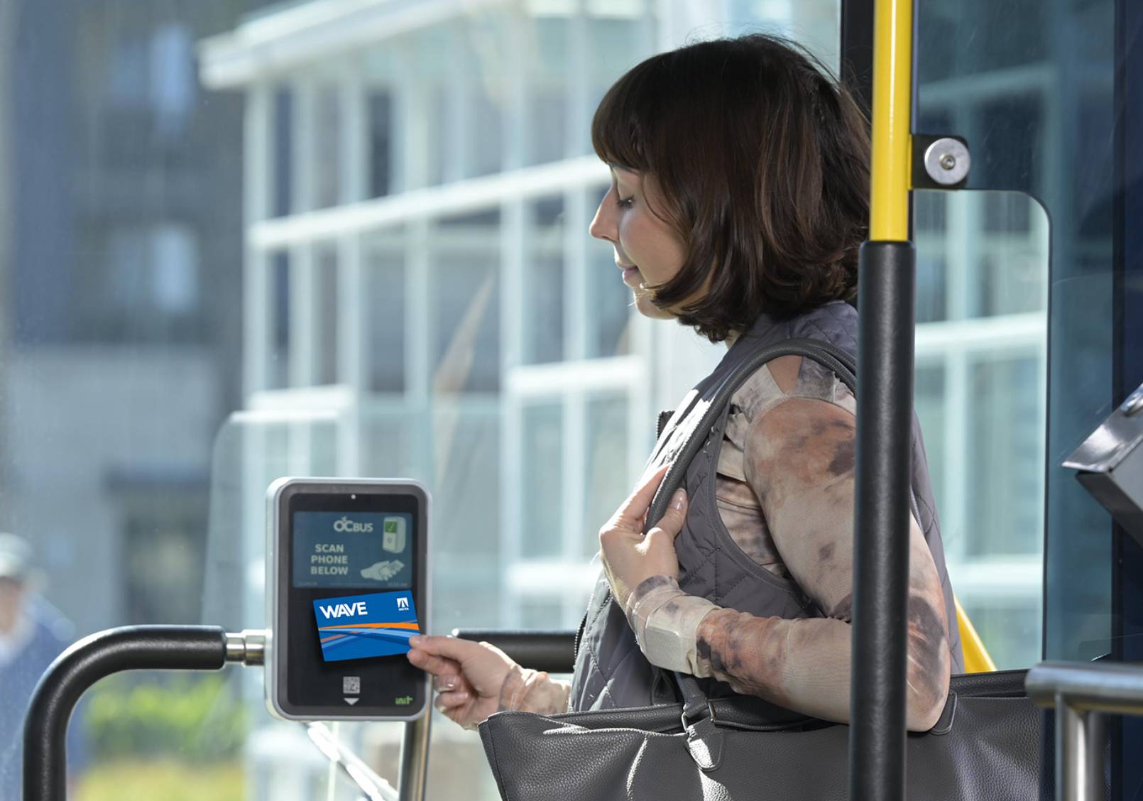 Photo of woman scanning card